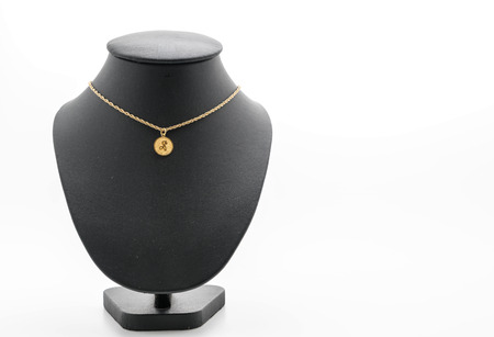 beautiful and luxury necklace with jewelry stand neck on whiteの写真素材