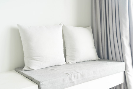 Beautiful pillow on sofa decoration in living room interiorの写真素材