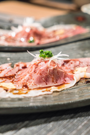 sliced beef sushi with sauce - japanese food styleの写真素材