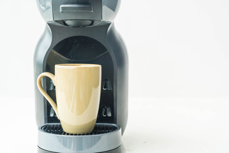 kettle and cup  on wall background with copy spaceの写真素材