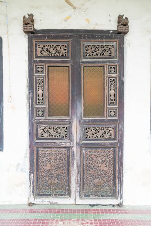 Old wooden brown vintage house doorの写真素材