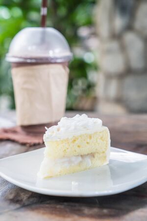 coconut cake on white plateの写真素材