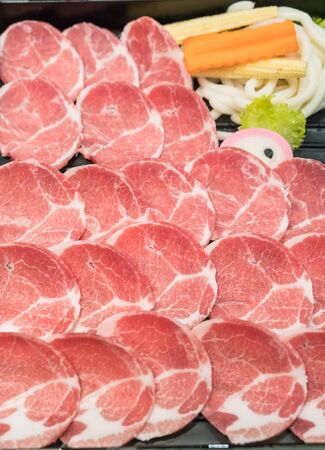 fresh sliced pork stack on plateの写真素材