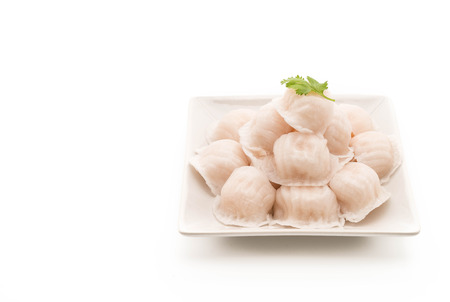 Steamed shrimp dumplings dim sum on white backgroundの写真素材