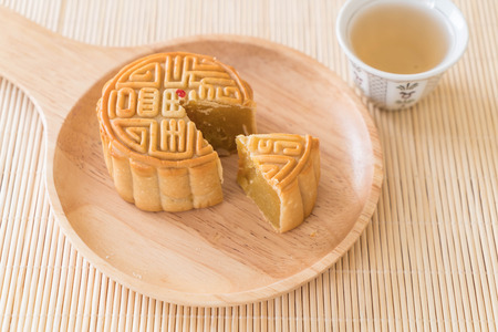 fresh moon cake on wood plate