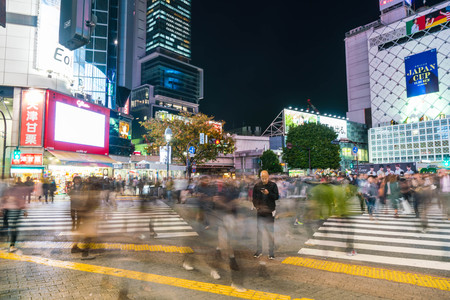 Tokyo, Japan, Nov 17, 2016: Shibuya Crossing Of City street with crowd people on zebra crosswalk in Shibuya town. Shibuya is a special ward located in Tokyo for shopping at night.のeditorial素材
