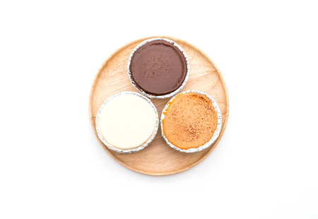 chocolate, vanilla milk and milk tea soft cake on white backgroundの写真素材