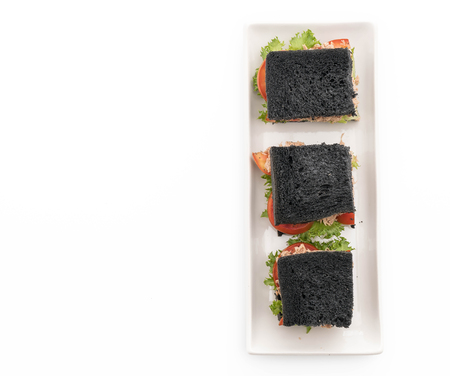 tuna charcoal  sandwich on white backgroundの写真素材