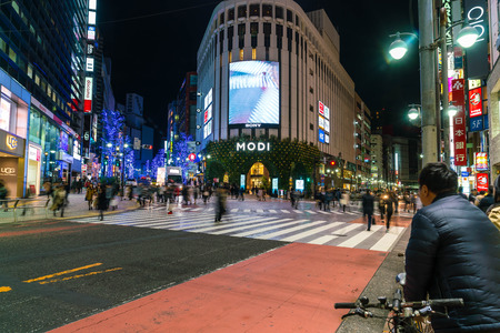 Tokyo, Japan, Nov 17, 2016: Shibuya Crossing Of City street with crowd people on zebra crosswalk in Shibuya town. Shibuya is a special ward located in Tokyo for shopping at night.のeditorial素材