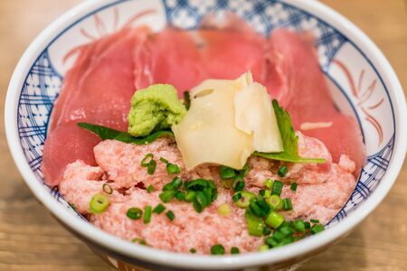 Fresh Tuna on top of Japanese rice - japanese food styleの写真素材