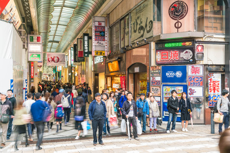 OSAKA, JAPAN - NOV 19 2016: Group of the people walking to shopping at the Osaka night market at Osaka city, Japanのeditorial素材