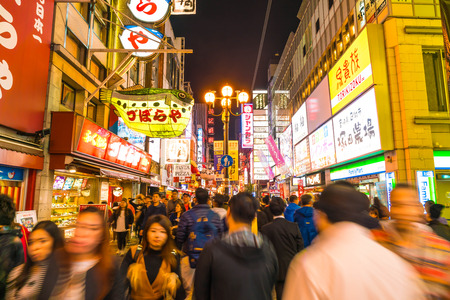 OSAKA, JAPAN - NOV 19 2016: Group of the people walking to shopping at the Osaka night market at Osaka city, Japanのeditorial素材