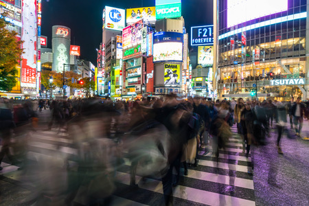 Tokyo, Japan, Nov 17, 2016: Shibuya Crossing Of City street with crowd people on zebra crosswalk in Shibuya town. Shibuya is a special ward located in Tokyo for shopping at night.のeditorial素材