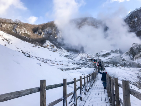 Jigokudani, known in English as "Hell Valley" is the source of hot springs for many local Onsen Spas in Noboribetsu, Hokkaido, Japan.の写真素材
