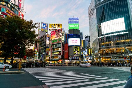 Tokyo, Japan, Nov 17, 2016: Shibuya Crossing Of City street with crowd people on zebra crosswalk in Shibuya town. Shibuya is a special ward located in Tokyo for shopping at night.のeditorial素材