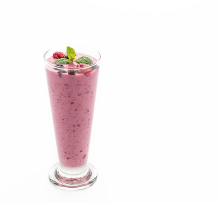 mixed berries with yogurt smoothies on white backgroundの写真素材