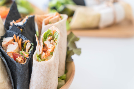 wrap salad roll on the tableの写真素材
