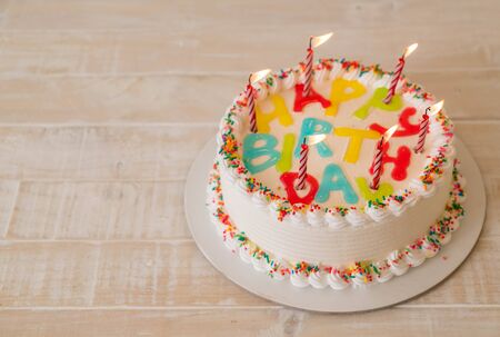 happy birthday cake on tableの写真素材