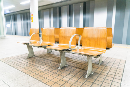 empty bench in a subway station.の写真素材