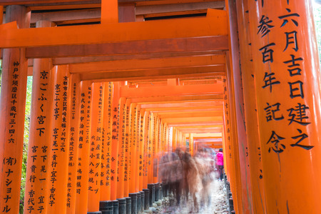 KYOTO, JAPAN - NOV 23, 2016: Torii Gateways in Fushimi Inari Taisha Shrine in Kyoto, Japan.のeditorial素材