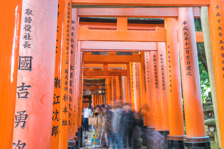 KYOTO, JAPAN - NOV 23, 2016: Torii Gateways in Fushimi Inari Taisha Shrine in Kyoto, Japan.のeditorial素材