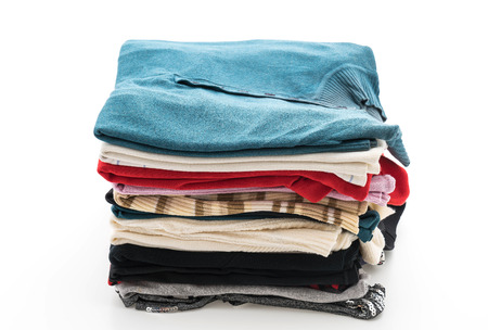 stacks of clothing on white backgroundの写真素材