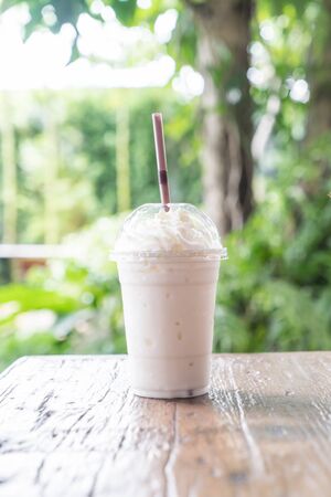 vanilla milkshake smoothie in cafeの写真素材
