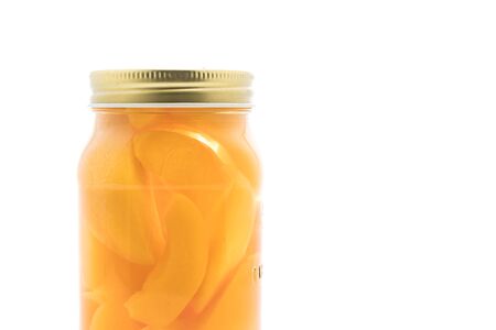 peach in bottle on white backgroundの写真素材