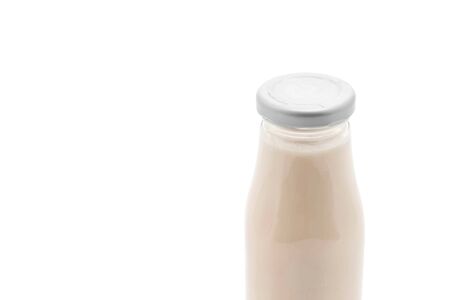milk in bottle on white backgroundの写真素材