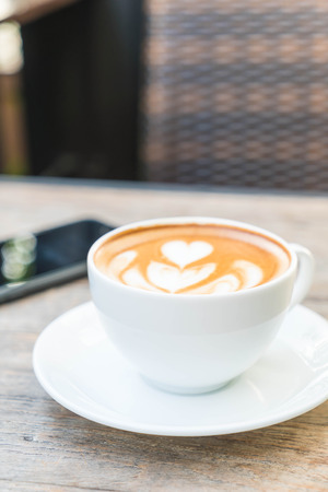 hot latte coffee in cafeの写真素材