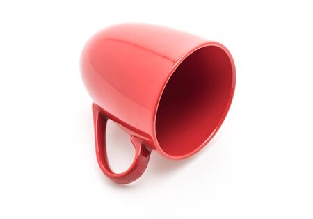 red ceramic mug on white backgroundの写真素材