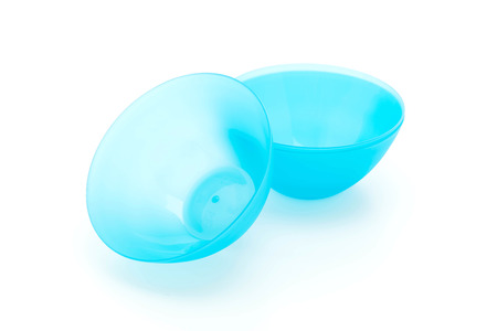 blue plastic bowl on white backgroundの写真素材