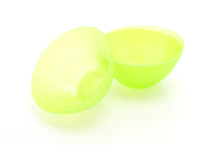 green plastic bowl on white backgroundの写真素材