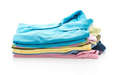 stacks of clothing on white backgroundの写真素材