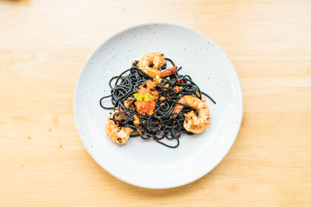stir-fried black spaghetti with shrimpの写真素材