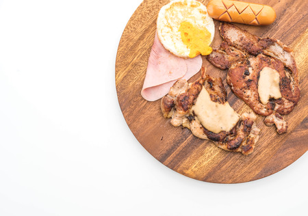 mix grilled steak on wood plate on white backgroundの写真素材