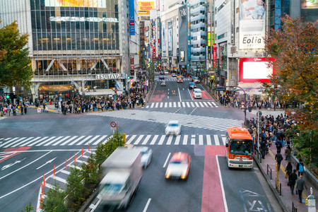 Tokyo, Japan, Nov 17, 2016: Shibuya Crossing Of City street with crowd people on zebra crosswalk in Shibuya town. Shibuya is a special ward located in Tokyo for shopping at night.のeditorial素材