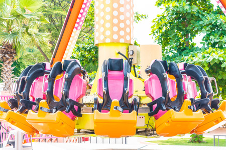 Colorful roller coaster seats at amusement park in Thailandのeditorial素材