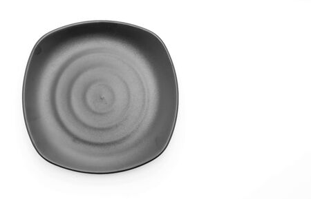 black plate on white backgroundの写真素材