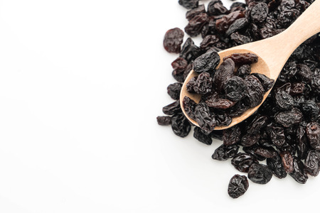 black raisins on white backgroundの写真素材