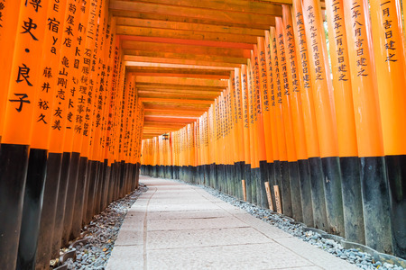the red torii gates walkway at fushimi inari taisha shrine in Kyoto, Japanのeditorial素材