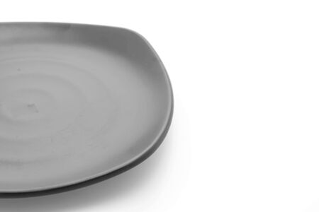 black plate on white backgroundの写真素材