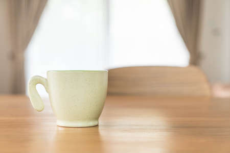coffee cup on wood tableの写真素材