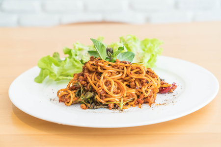 spaghetti pork with tomatoes sauce - italian food styleの写真素材
