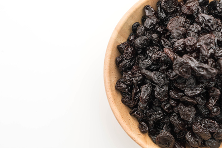 black raisins on white backgroundの写真素材