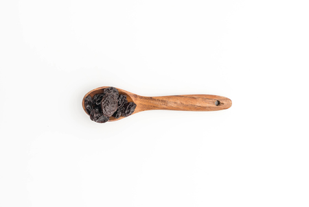 black raisins on white backgroundの写真素材