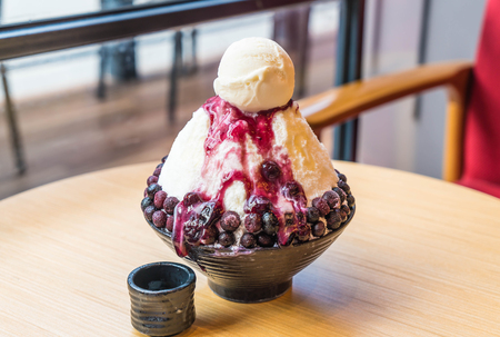 ice shave with blueberries and vanilla ice-cream (bingsu - korean dessert)の写真素材