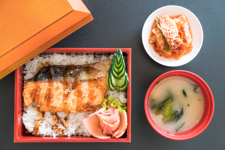 teriyaki salmon on top rice in box set - japanese food styleの写真素材