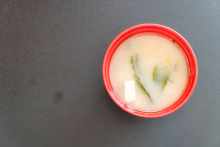miso soup in red cup - japanese food styleの写真素材