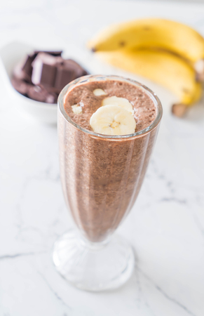 chocolate banana milkshake in glass - selective focus pointの写真素材